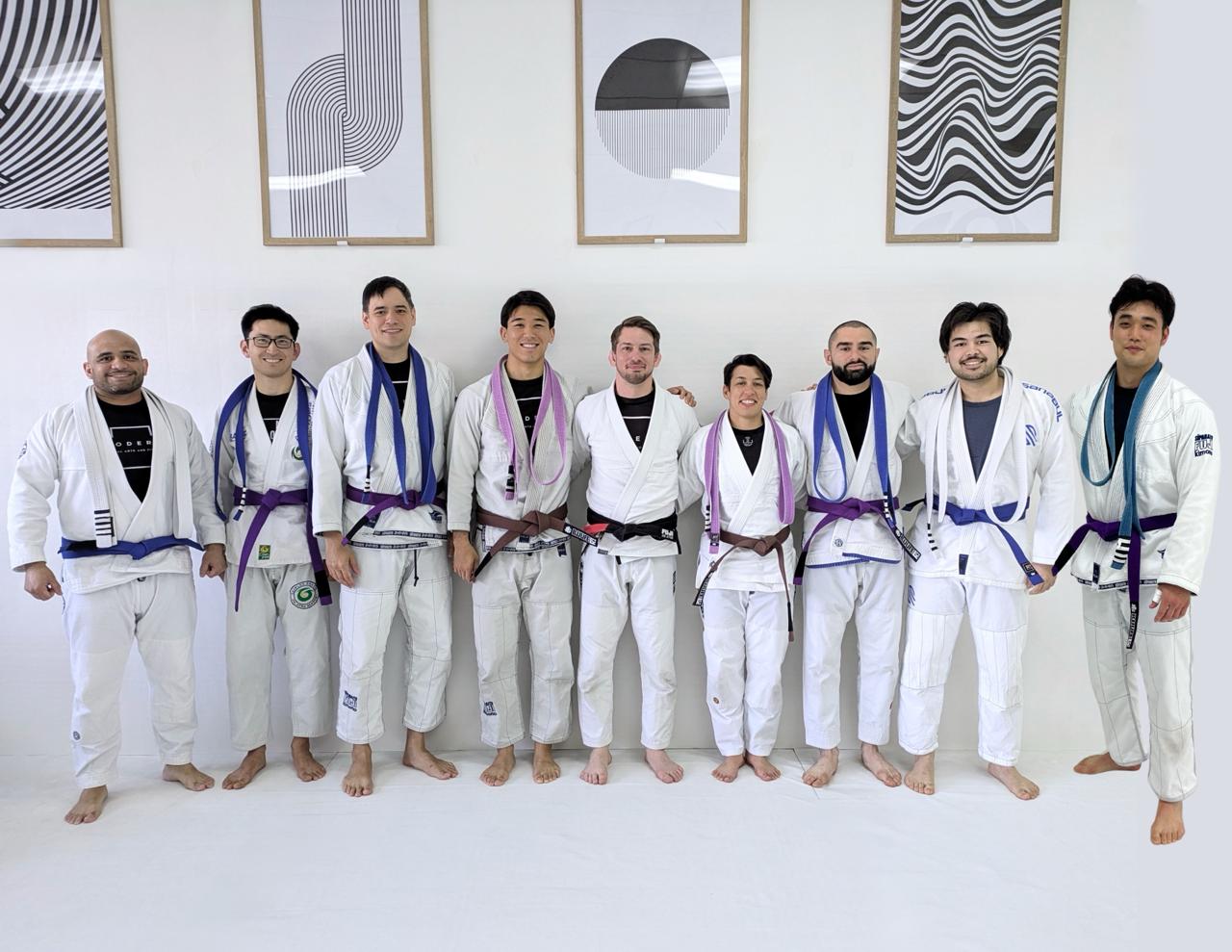 Newly promoted students with their belts