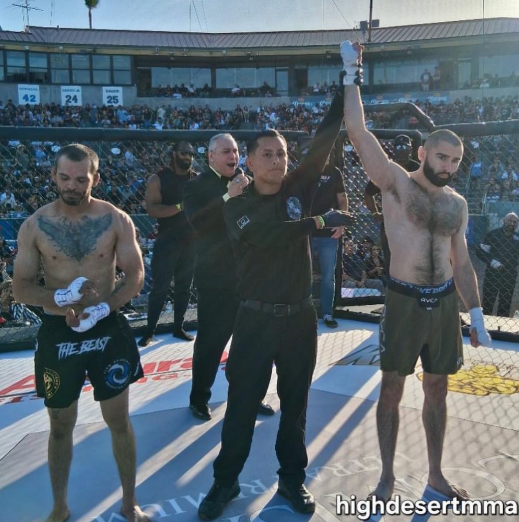 Pierre Tobgui gets his hand raised after winning his second MMA fight at King of the Cage Strike Zone II
