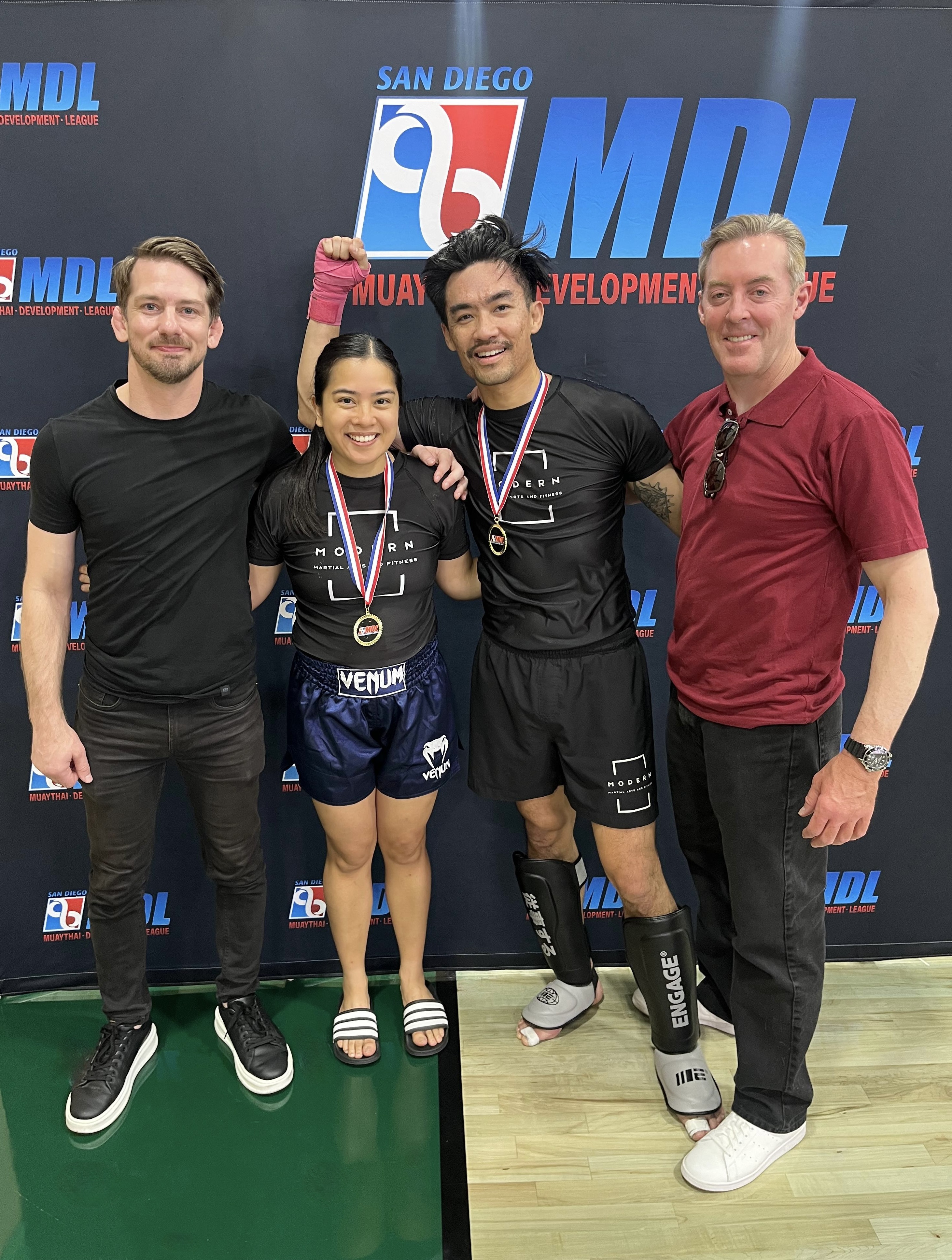 Loc Le and Rachel Corapi with their coaches and team at MDL San Diego XI